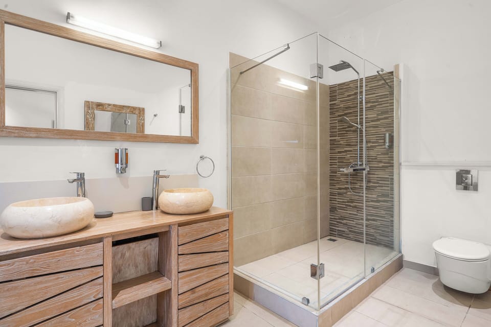 Family Quadruple Room, 2 Queen Beds | Bathroom | Shower, soap, toilet paper
