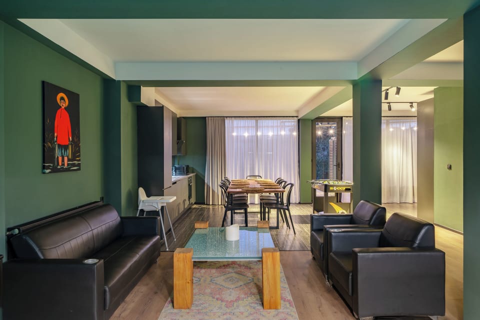 Comfort Apartment, 4 Bedrooms, Courtyard View | Living area | Flat-screen TV