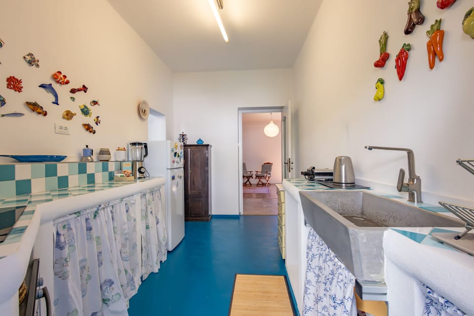 Apartment, 2 Bedrooms, Sea View | Private kitchen | Fridge, microwave, oven, stovetop