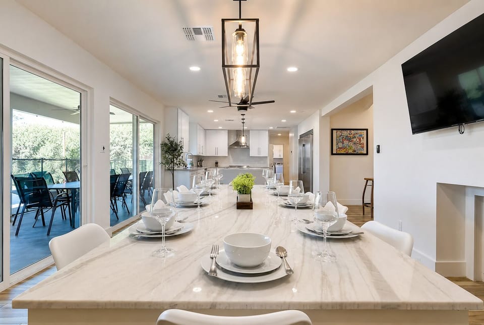 Beautiful quartz dining table with seating for 10 - big smart tv and wood burnin