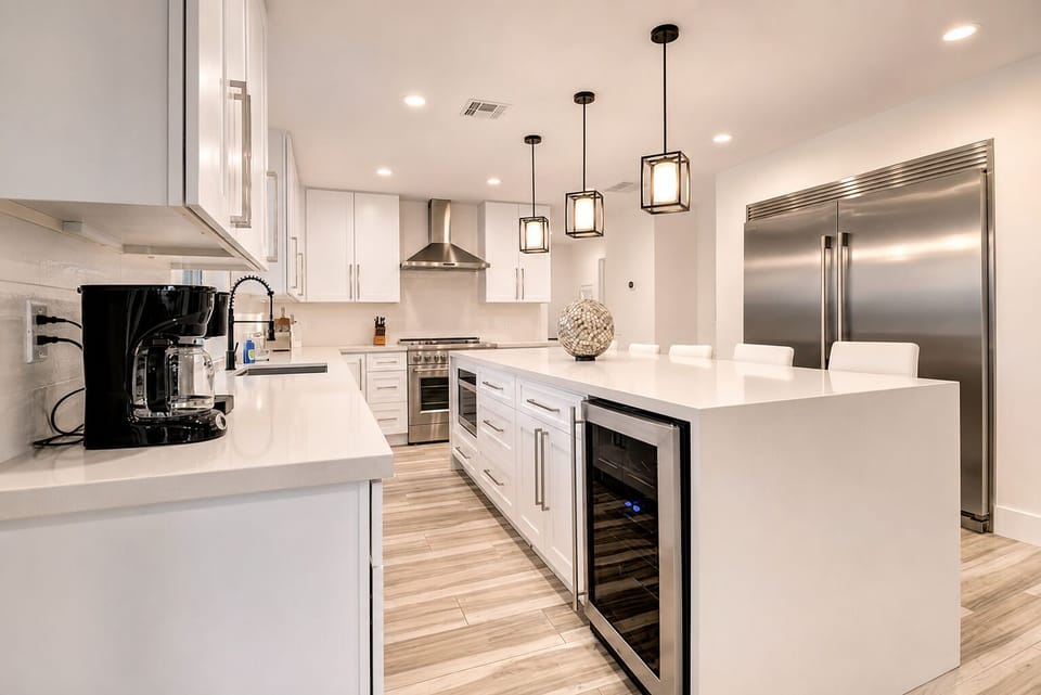 Beautiful new kitchen, quartz counters with wine fridge and industrial appliance