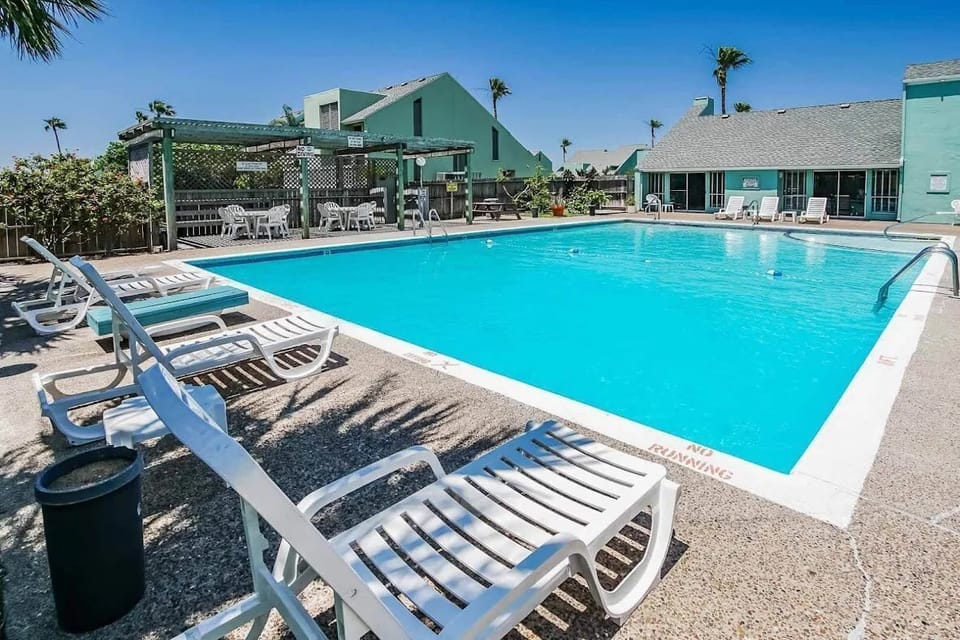 Spacious outdoor pool area perfect for soaking up the Texas sun.