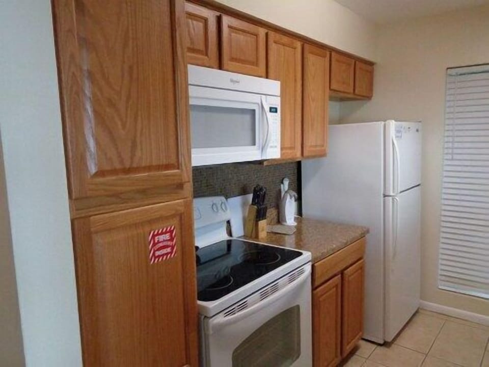 Bright kitchen with a welcoming vibe, where the rhythm of island living begins each morning.