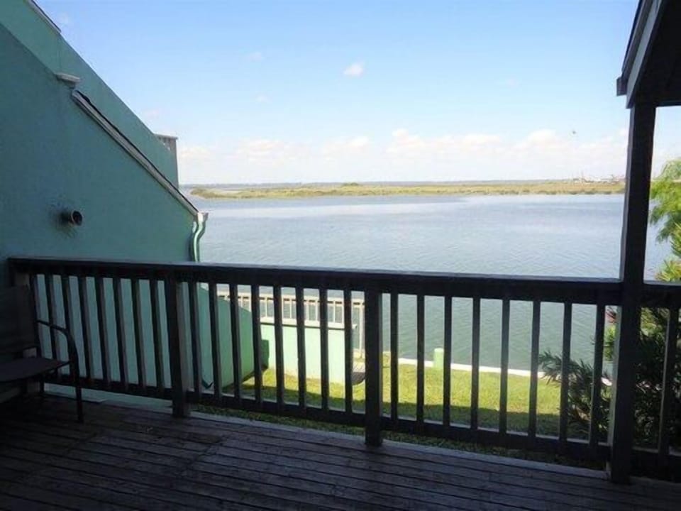 Private balcony overlooking the scenic bay—ideal for sunrise reflections or sunset conversations.