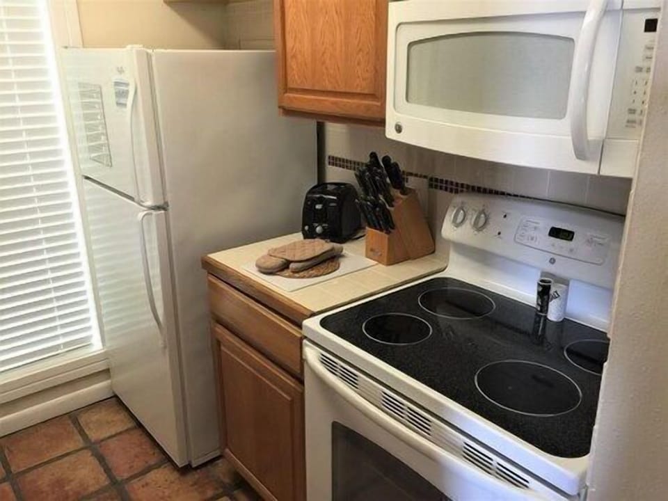 Welcoming kitchen where mornings start with fresh coffee and the sound of gentle Gulf breezes drifting through.