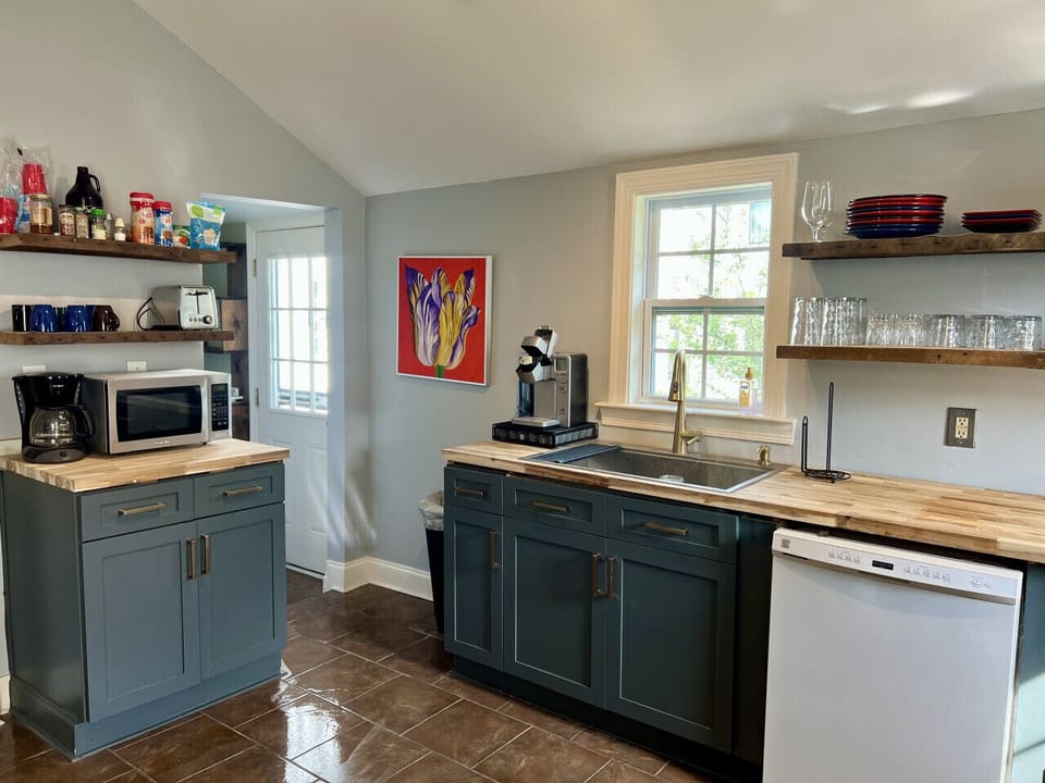 Fully equipped kitchen for morning coffee or simple meals.