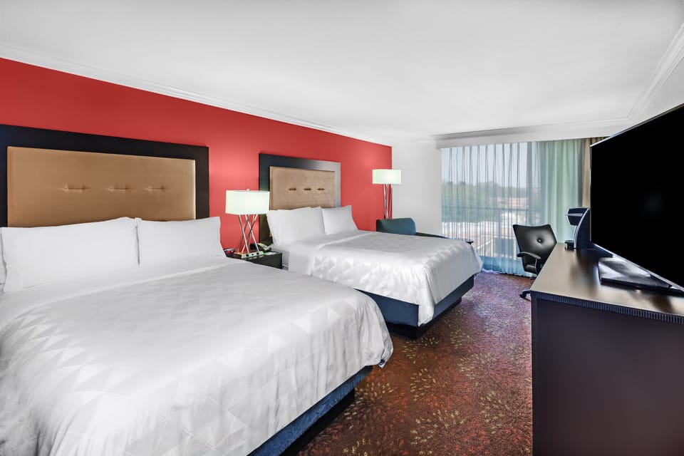 Hypo-allergenic bedding available, in-room safe, desk, laptop workspace