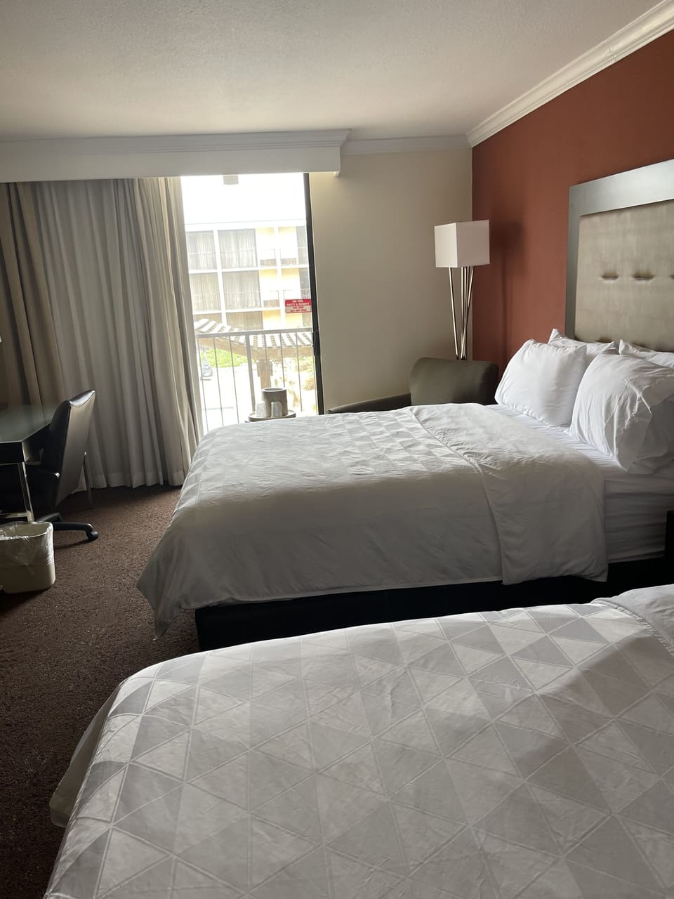 Standard Room, 2 Queen Beds, Courtyard View | Hypo-allergenic bedding available, in-room safe, desk, laptop workspace