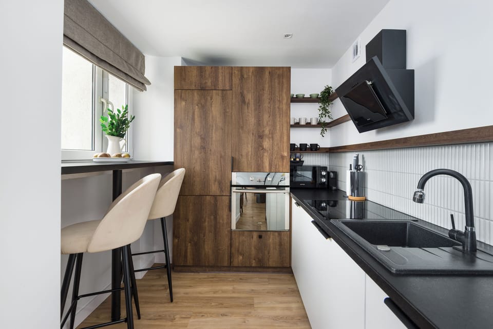 Deluxe Apartment, City View | Private kitchen | Full-size fridge, microwave, oven, stovetop