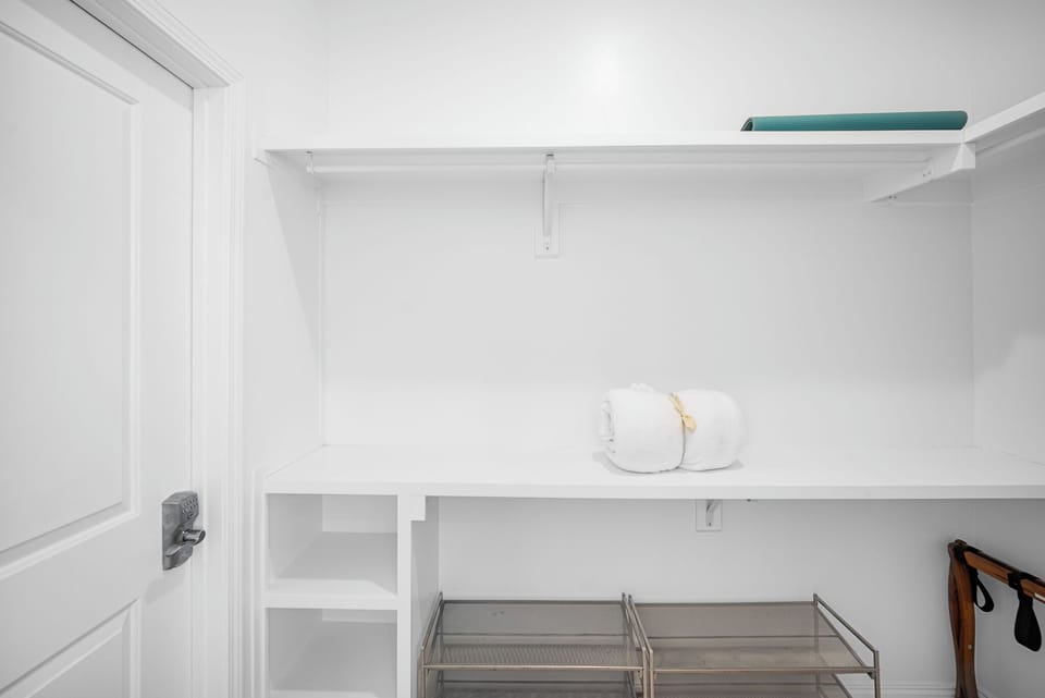 Minimalist magic and mindful calm—an organized closet for breezy beach life.