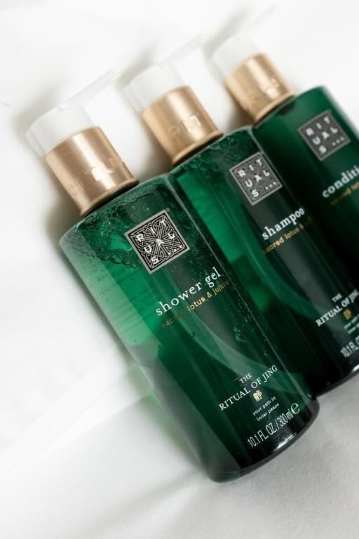 Shower, designer toiletries, hair dryer, bathrobes