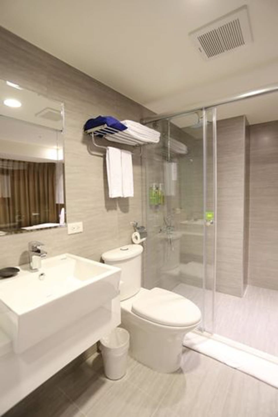 Shower, free toiletries, hair dryer, slippers
