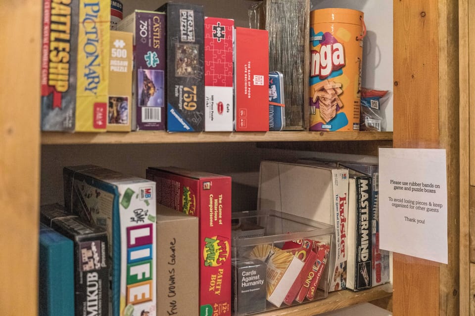 In the hallway on the first floor we have a game closet ready for a competitive family game night! 