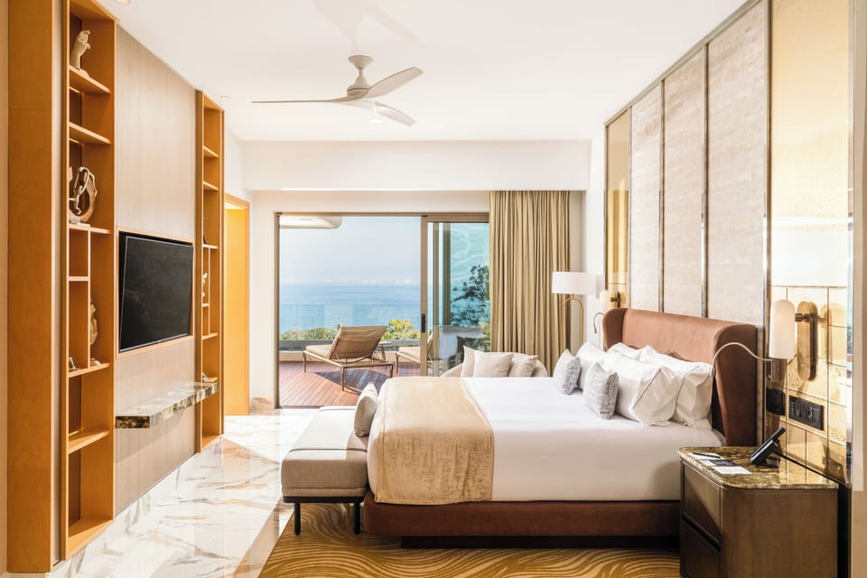 Sanctuary Jr Suite King | Minibar, in-room safe, desk, laptop workspace
