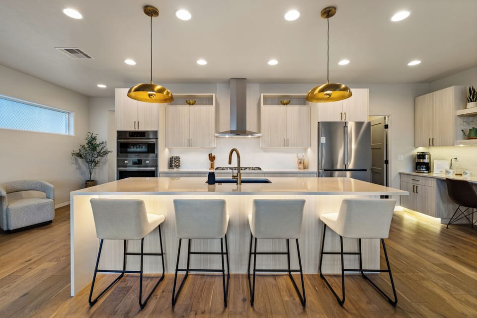 Stocked Chef’s Kitchen with Quartz Countertops, Stainless Bosch Appliances & Coffee Station
