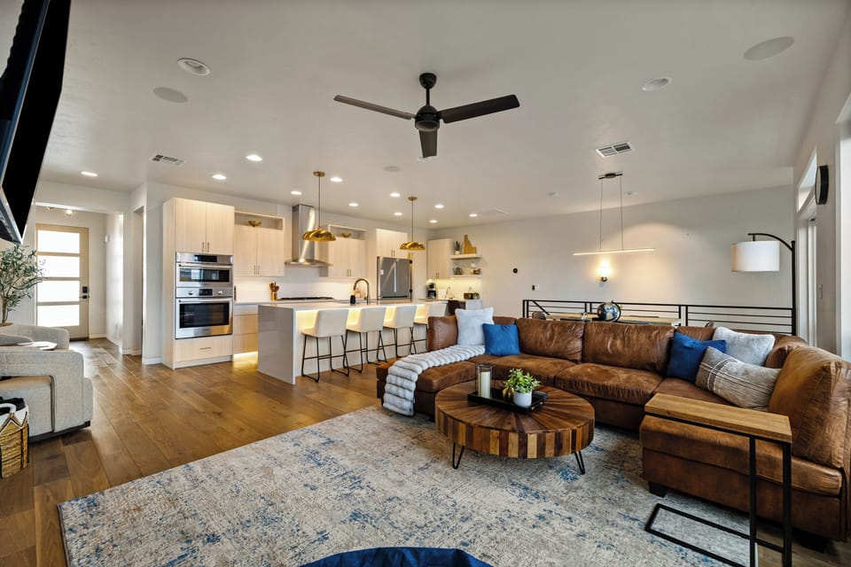 Bring the outdoors in—an airy open floorplan where kitchen, dining, and living spaces flow seamlessly, framed by endless Boise Foothills views and natural light.