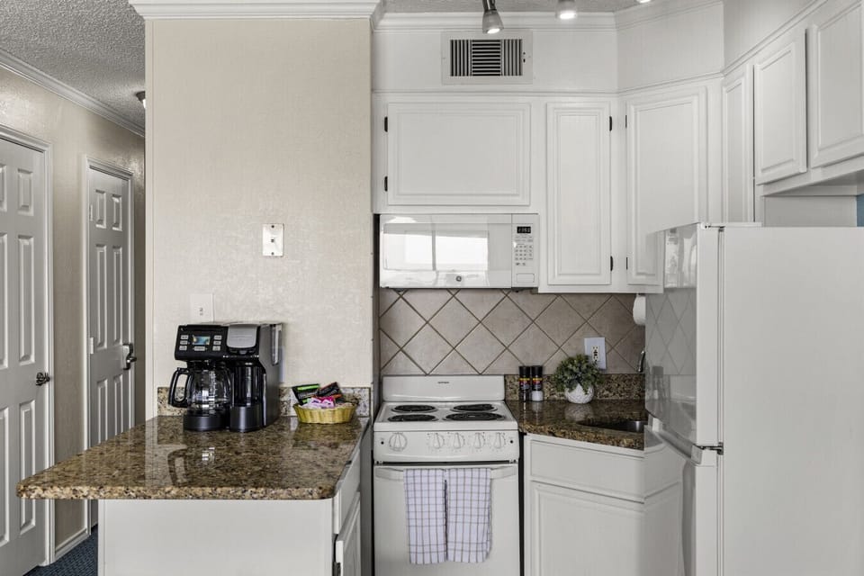 Fully equipped kitchen with full-size appliances—everything you need for meals during your stay.