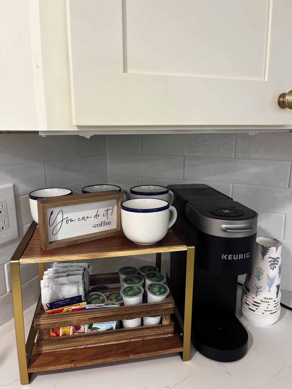 Coffee bar stocked with regular and decaf, teas, and hot cocoa