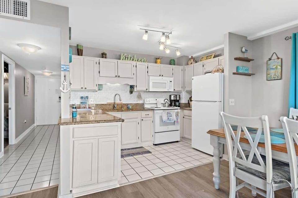 This kitchen is clean, spacious, and every essential appliance you may need