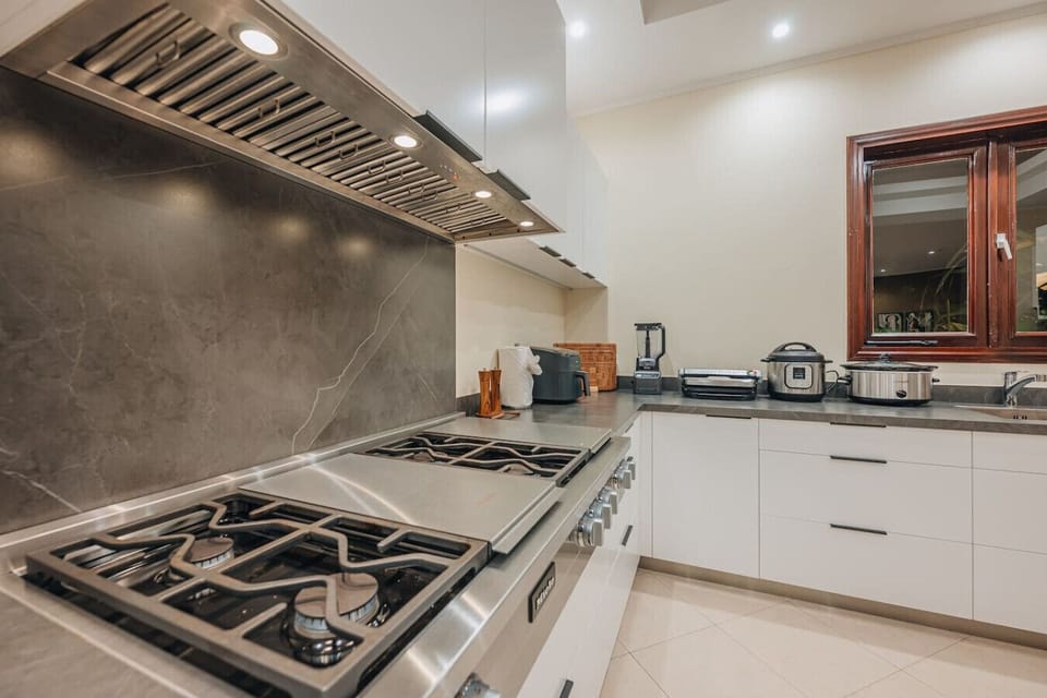 Gourmet kitchen stocked for feasts.