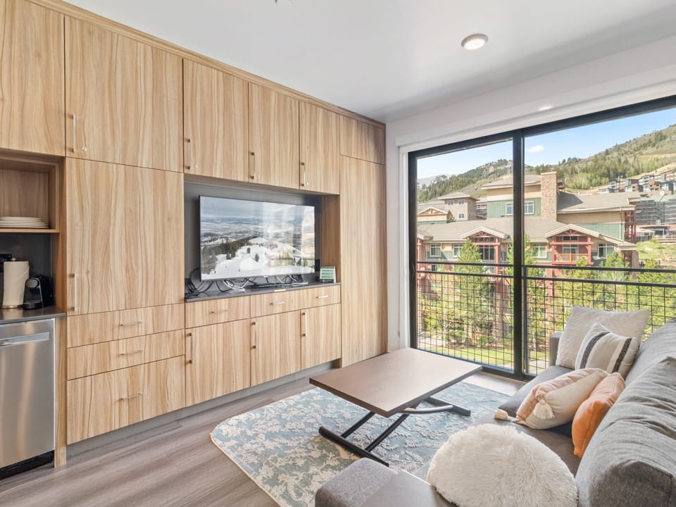 Studio living area with queen Murphy bed