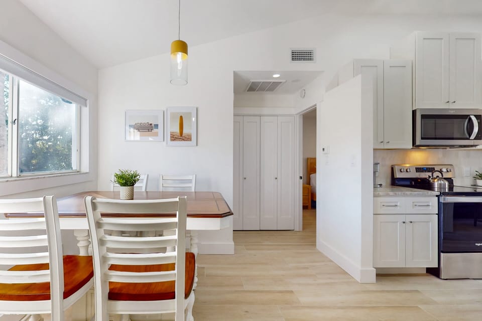 Dining table seats four