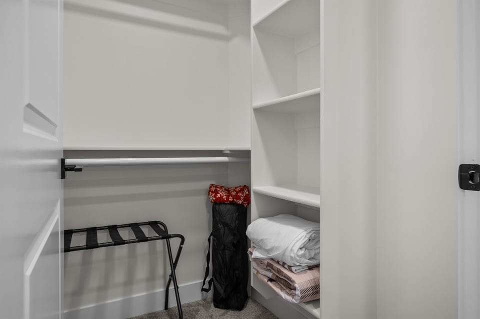 A walk-in closet provides ample storage.