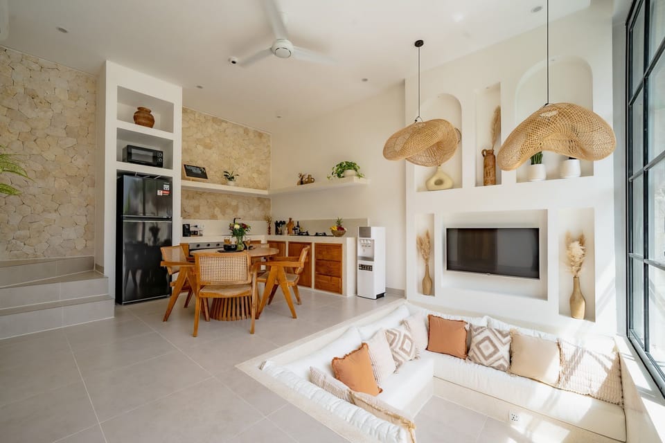 Deluxe Villa, 1 King Bed, Patio, Pool View | Living room | 43-inch TV with cable channels