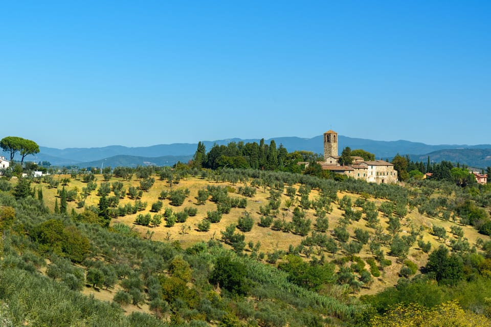 Countryside landscape with church Pieve di Santa Cecilia