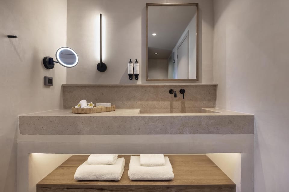 Tropical Bungalow Suite | Bathroom | Designer toiletries, hair dryer, bathrobes, slippers