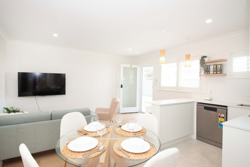 An inviting dining space with comfortable seating for four.