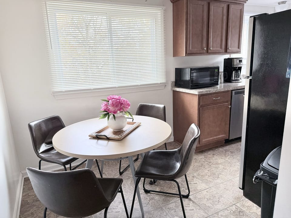 A kitchen that can seat four people