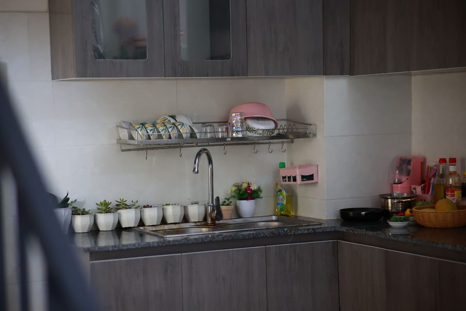 Fridge, microwave, stovetop, cookware/dishes/utensils