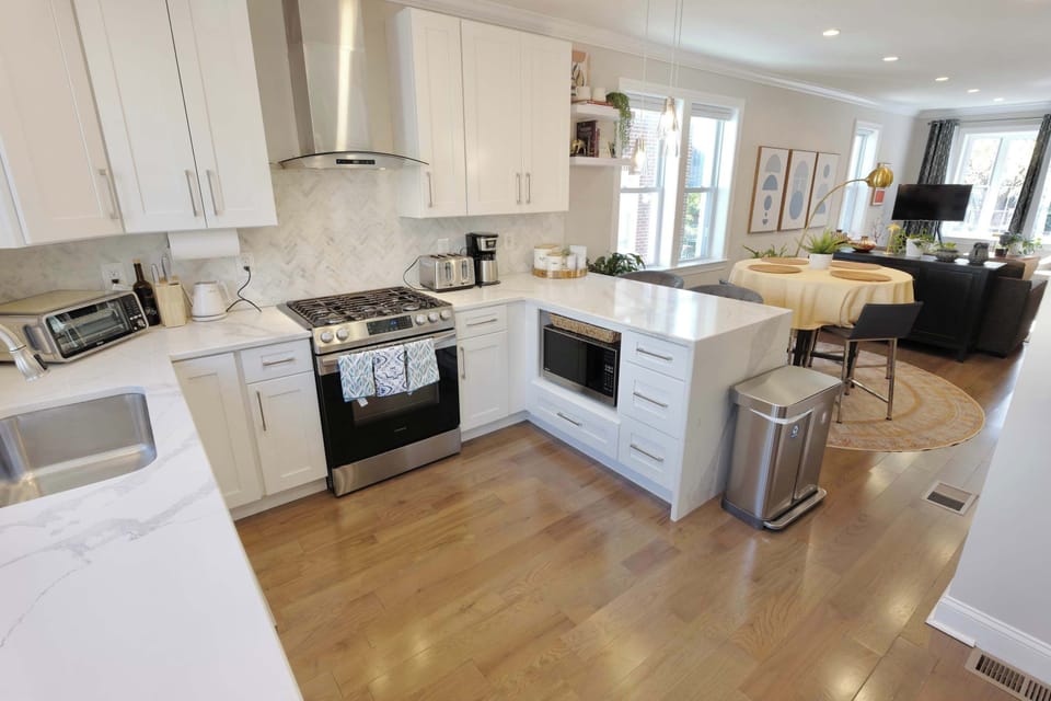 The modern kitchen comes equipped with coffee, coffee maker, and all cooking essentials to whip up a delicious meal!