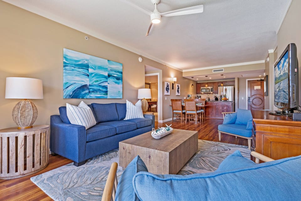 Unwind in a cozy lounge area with stylish décor and easy access to the dining space—perfect for entertaining or relaxing
