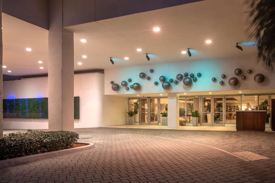 Property entrance and evening lighting.