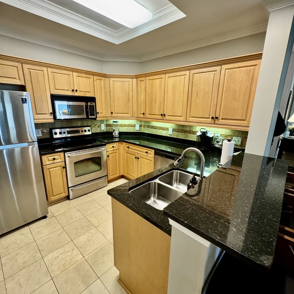 Condo, 2 Bedrooms | Private kitchen | Coffee/tea maker, fridge, oven, toaster
