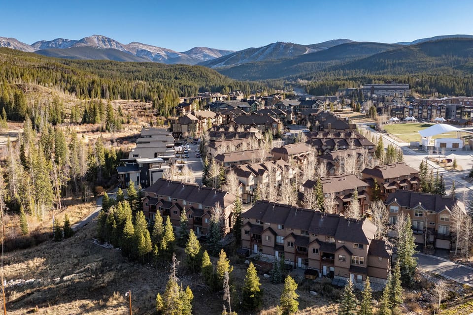 Mountain resort community nestled among towering peaks and evergreen forests, offering a perfect base for alpine adventures.