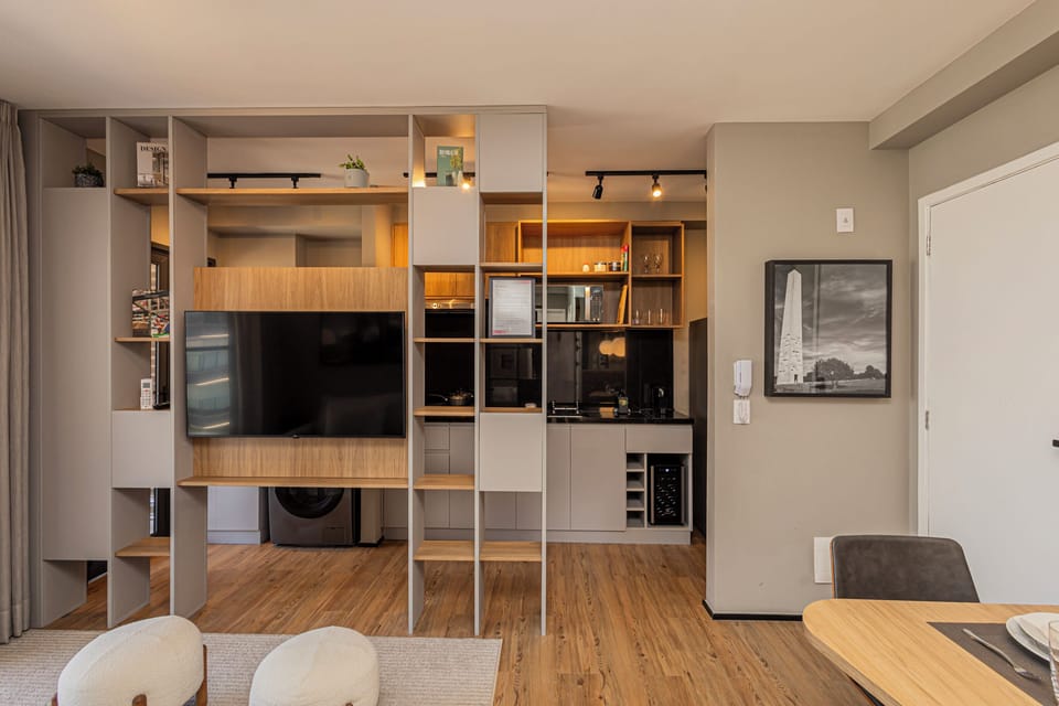 Deluxe Apartment, City View | Living room | Flat-screen TV