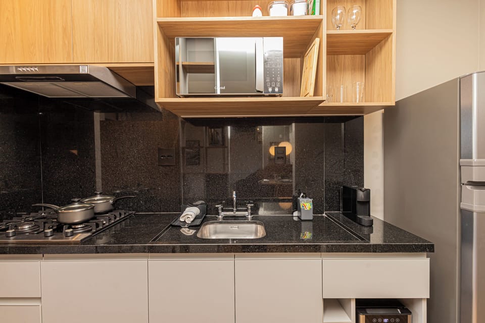 Deluxe Apartment, City View | Private kitchen | Fridge, microwave, stovetop, cookware/dishes/utensils