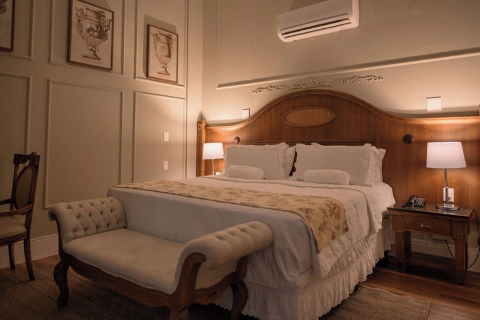 Sink into crisp sheets and relax under glowing bedside lamps.