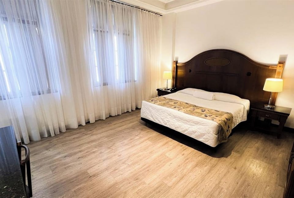 Unwind in a bright, spacious room with crisp linens.