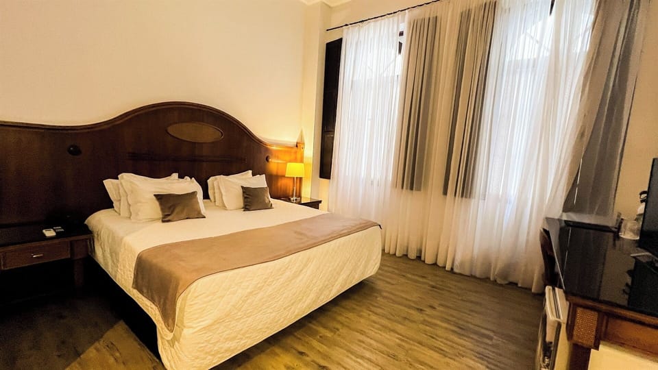 Recharge beside a cozy lamp with everything within reach.