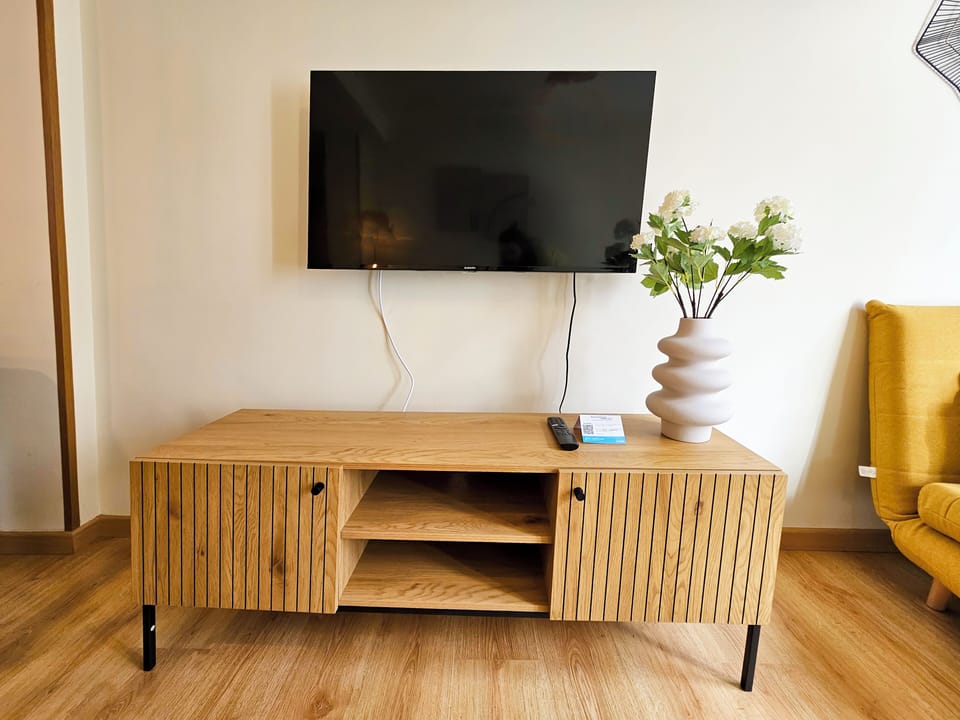 Comfort Apartment | Living area | TV