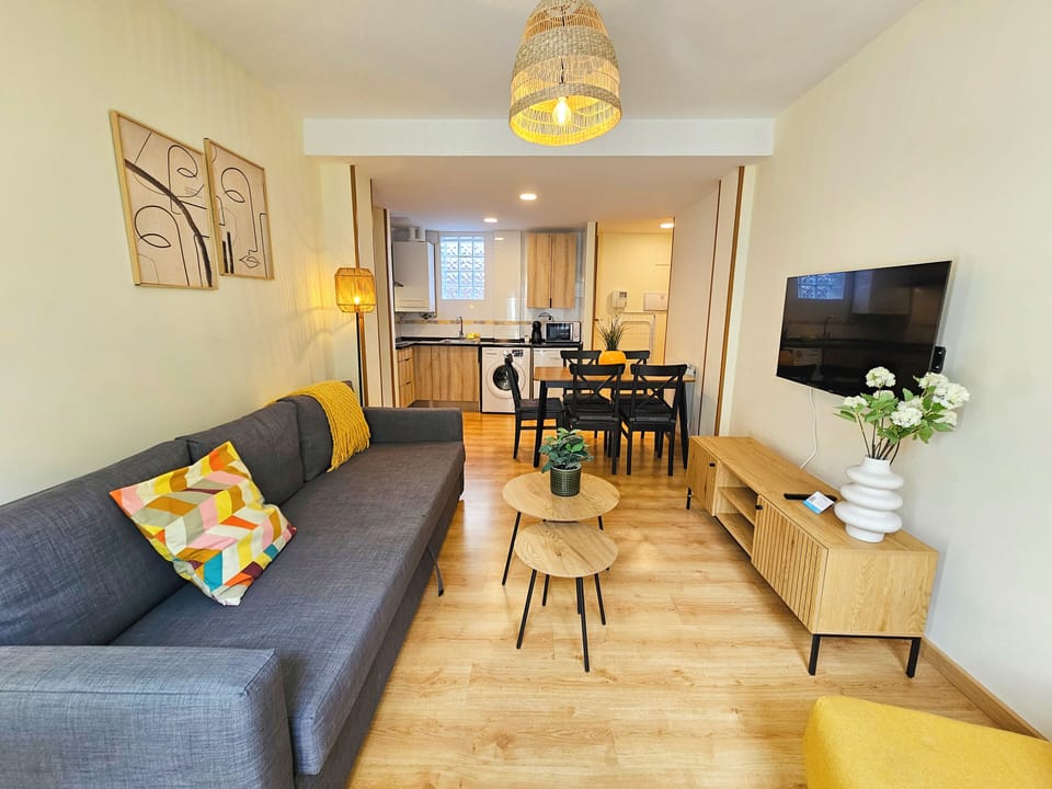 Comfort Apartment | Living area | TV