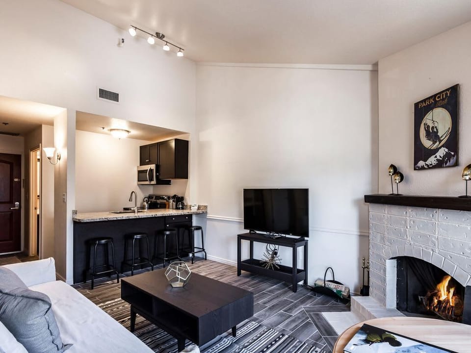 Kitchen opens to cozy living area