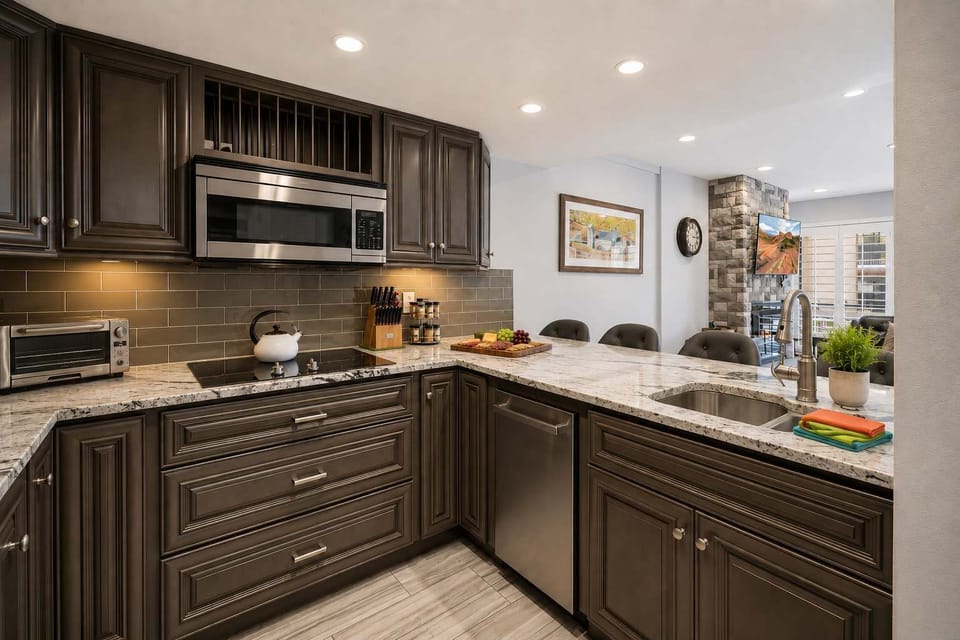 Kitchen w/ Microwave and Electric Stove Top