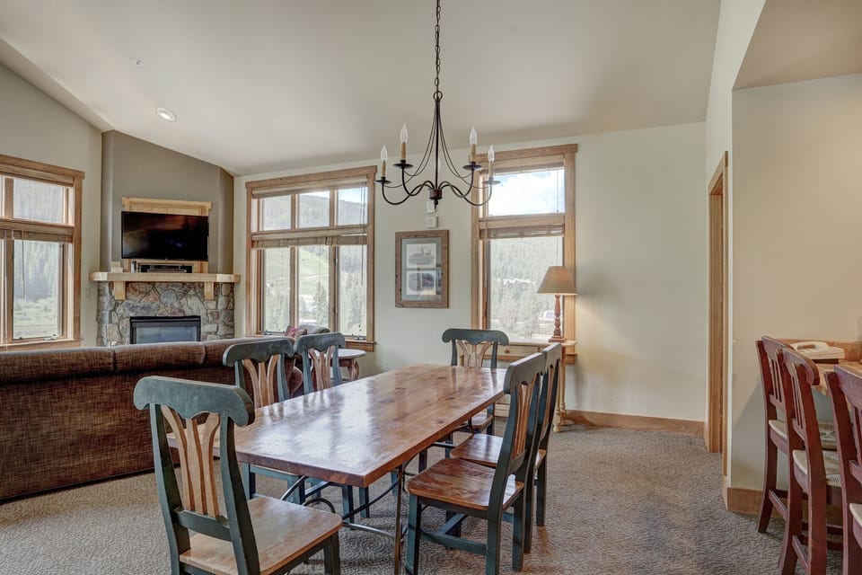 The open-concept dining room offers the perfect balance of style and comfort, with views that make every meal memorable.