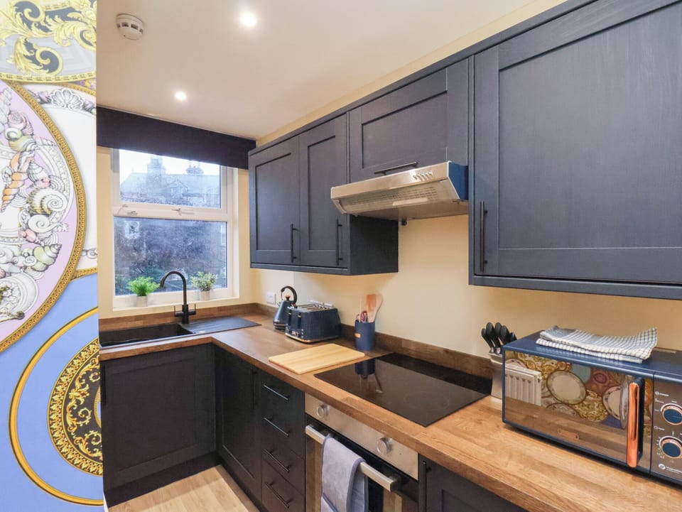 Fridge, microwave, toaster, cookware/dishes/utensils