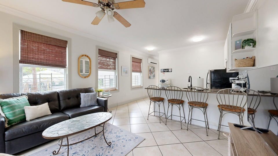 Living Room with Barstool Dining Area